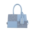 Borsa a mano azzurra con design patchwork e finitura in ecopelle testurizzata - Blu