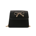 Borsa a sella nera minimalista con fiocco dorato e tracolla a catena da donna - Nero