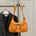 Retro orange crescent shoulder bag with metallic buckle and dual zipper pockets for women - Orange