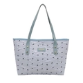 Lavender quilted tote bag with blue handles and black bow patterns for women - Blue