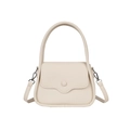 Minimalist off-white pebble grain mini handbag with circular handle and crossbody strap - White