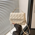 Minimalist beige quilted square handbag with chain handle and crossbody strap - White