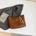 Brown woven pattern tote bag with slender handles and a decorative rope pendant - Style With Charm / Brown With Pendant