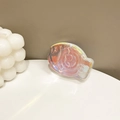 Macro view of fish-shaped holographic phone grip with iridescent laser finish effect - Adhesive Blue Light Fish Stand (Transparent)