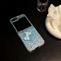 Detail of glitter heart and blue bow on a clear protective case for Samsung Galaxy Z Flip - Matte Hard Shell-Glitter Drip-Sweet Heart Quicksand-Blue / Samsung ZFlip3