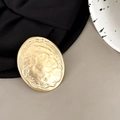 Close-up of gold oval phone grip featuring an artistic water ripple metal texture - Oval Shape - Matte Gold