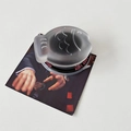 Detail view of fish-shaped MagSafe phone grip with embossed texture and Good Luck text - Taiyaki Fish (700321) / Magnetic - Black