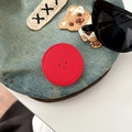 Detail of denim blue phone socket with cartoon bear embroidery and red button decoration - Red