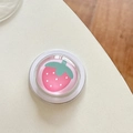 Close-up of a pink phone grip with a cute strawberry pattern and crystal resin coating - Magnetic Crystal Glass Pink Strawberry
