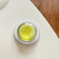 Detailed macro view of a 3D resin cucumber slice phone grip with realistic seeds - Magnetic Crystal Glass Cucumber Slice