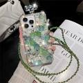Macro detail of luxury perfume bottle phone case with green floral resin and rhinestones - iPhone 7/8/SE 2020 / Green