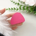 Macro detail of rose red leather phone grip with precision stitching and embossed quote - Rose Red
