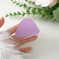Detailed view of purple leather triangle phone grip with Mountain embossed texture - Purple