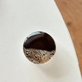 Close-up of a circular phone grip featuring a realistic coffee or cola liquid texture - Transparent Stand Crystal Glass Americano