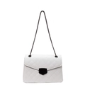 Chic white quilted crossbody bag with black metallic clasp and stylish chain strap - Off-white