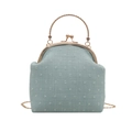 Borsa a tracolla azzurra minimalista con manico in metallo e texture floreale - Verde