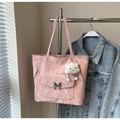 Pink nylon tote bag featuring a silver butterfly buckle and a white plush cloud charm - Pink