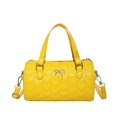 Yellow heart-quilted cylinder handbag with bow decoration and detachable strap - Yellow