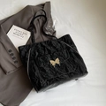 Black crinkle leather tote backpack with golden butterfly buckle and side zippers - Black