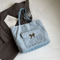 Light blue crinkle texture tote bag with a metallic butterfly clasp in a stylish setting - Blue without Pendant