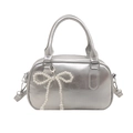 Silver metallic bowling handbag for women with pearl bow charm and top handles - Silver