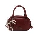 Deep red bowling handbag for women with pearl bow pendant and silver hardware accent - Red