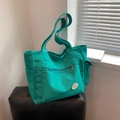 Grande borsa tote in tela verde con tasca frontale a zip e tasche laterali - Verde