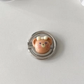Detail view of a silver metal phone ring stand with a 3D cartoon bear and a bow decoration - Bear Head with Bowtie