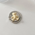 Close-up of a silver metal phone ring holder featuring a cute cream 3D teddy bear design - Apricot Bear