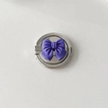 Detailed macro view of silver metal phone ring holder with a purple 3D bow design - Purple Small Bowknot