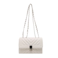 Quilted white crossbody bag with silver chain strap and metal lock closure - White