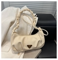 Detail of cream pleated shoulder bag featuring twill fabric and triangle metal logo - Off White