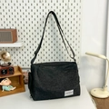 Borsa a tracolla in tela nera unisex con cinturino regolabile e dettaglio del logo - Nero