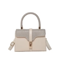 Elegant beige PU leather handbag with rhinestone handles and gold twist lock in frontal view - Khaki