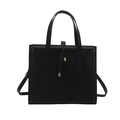 Minimalist black square leather handbag with gold metal accents and crossbody strap - Black