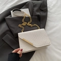 White woven texture crossbody bag with gold chain strap and metallic trim - White
