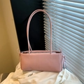 Minimalist pink underarm shoulder bag for women with slim straps and knot detail - Pink