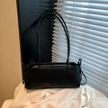 Minimalist black underarm shoulder bag with sleek matte finish and thin straps - No Pendant / Black