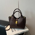 Elegant dark brown minimalist leather bucket bag with a golden metal buckle accent - Coffee No Pendant