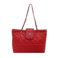 Elegant red quilted tote bag with silver metal bow and woven chain shoulder strap - Red