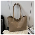 Detail shot of khaki woven texture synthetic leather and silver rivets on tote bag - Khaki