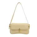 Chic cream leather baguette shoulder bag with gold oval lock and adjustable strap - Yellow