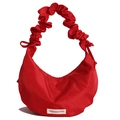 Red nylon crescent bag with stylish scrunchie strap and fashion label detail - Red
