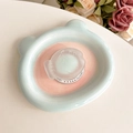 Detail of frosted taiyaki phone grip on a blue bear-shaped ceramic tray with Gift For You text - Green Fish
