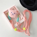 Macro detail of plush pink bear phone strap with adjustable woven cord in gift box - Pink Plush Bear (with Braided Rope)