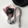 Detail of a braided black and white crossbody lanyard with a plush cartoon bear charm - Black Plush Bear (with Braided Rope)