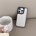 Close-up of white lychee leather phone case with black frame for iPhone 16 Pro Max - Large-pore Textured Surface - Single Shell - Silver