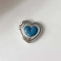 Detail view of heart-shaped mobile ring holder with silver frame and navy blue resin inlay - Blue