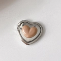 Detail view of heart-shaped phone ring stand with pink glossy finish and silver plating - Milk Coffee