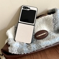 Detail of lychee pattern leather texture on folding phone case for Samsung Z Flip 6 - Beige